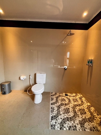 Imagen de la habitación del Hotel qwank kuta lombok. Foto 13