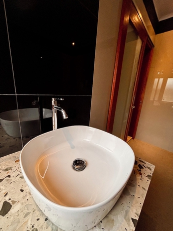 Imagen de la habitación del Hotel qwank kuta lombok. Foto 14