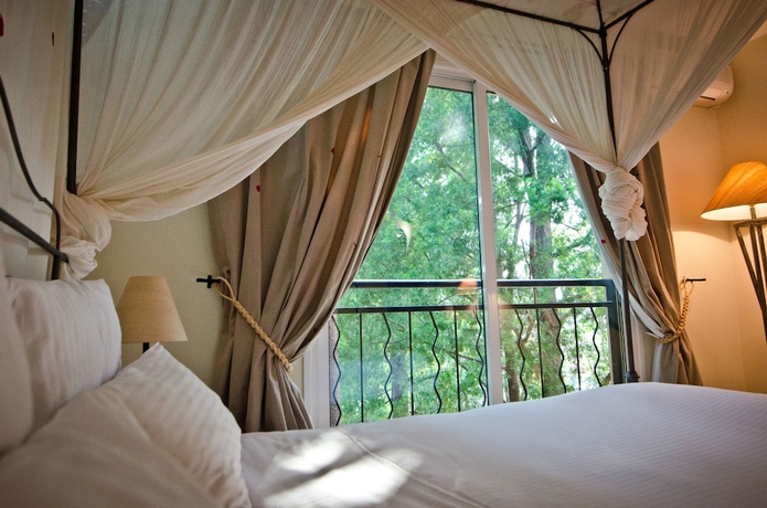 Imagen de la habitación del Hotel relais des plateaux & spa- ivato international air. Foto 2