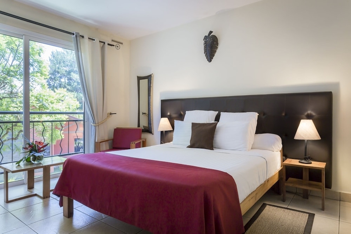 Imagen de la habitación del Hotel relais des plateaux & spa- ivato international air. Foto 6