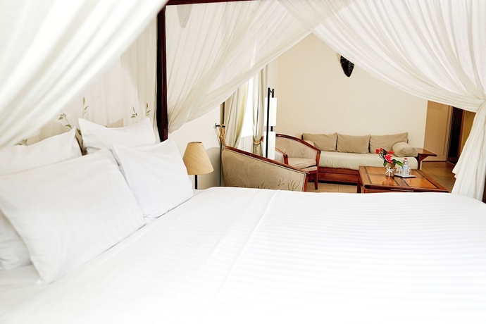 Imagen de la habitación del Hotel relais des plateaux & spa- ivato international air. Foto 12