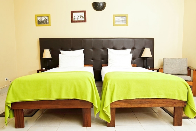 Imagen de la habitación del Hotel relais des plateaux & spa- ivato international air. Foto 15