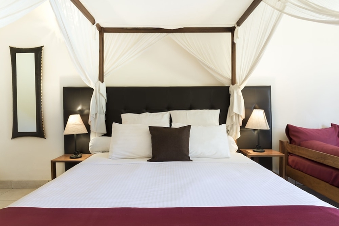 Imagen de la habitación del Hotel relais des plateaux & spa- ivato international air. Foto 17