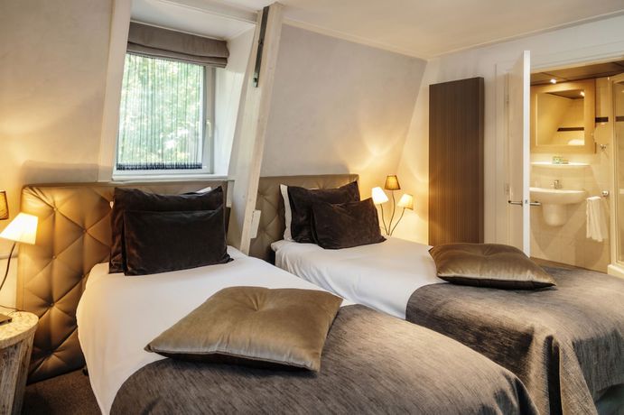 Imagen de la habitación del Hotel restaurant De Wolfsberg. Foto 10