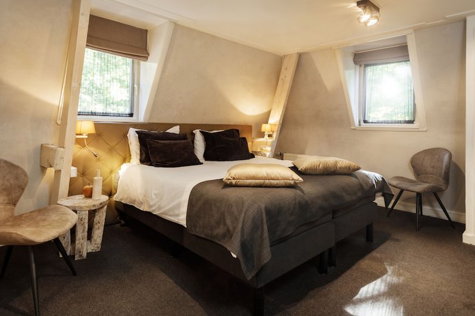Imagen de la habitación del Hotel restaurant De Wolfsberg. Foto 11