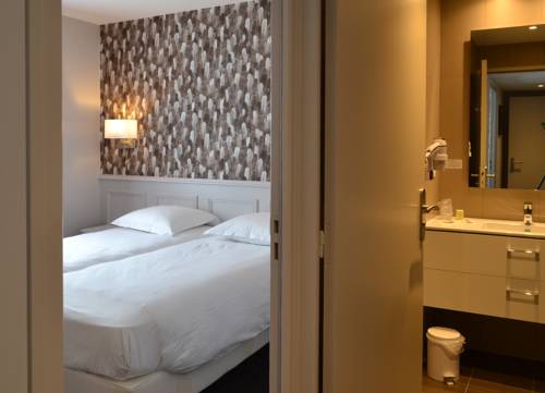 Imagen de la habitación del Hotel -restaurant Le Monarque. Foto 11