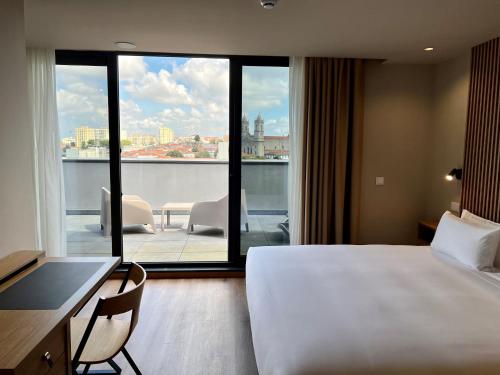 Imagen de la habitación del Hotel room Select Porto. Foto 20