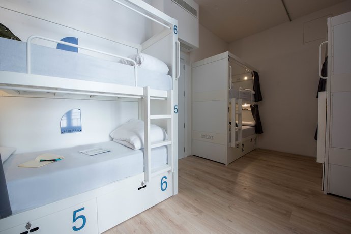 Imagen de la habitación del Hotel room00 Gran Vía Hostel. Foto 2