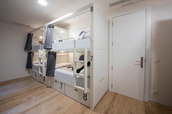 Imagen de la habitación del Hotel room00 Gran Vía Hostel. Foto 8