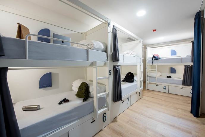 Imagen de la habitación del Hotel room00 Gran Vía Hostel. Foto 12