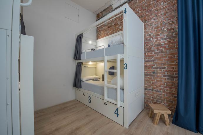 Imagen de la habitación del Hotel room00 Gran Vía Hostel. Foto 18