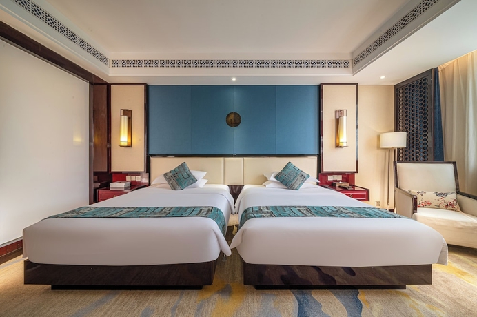 Imagen de la habitación del Hotel runhuasijidajiudian. Foto 13