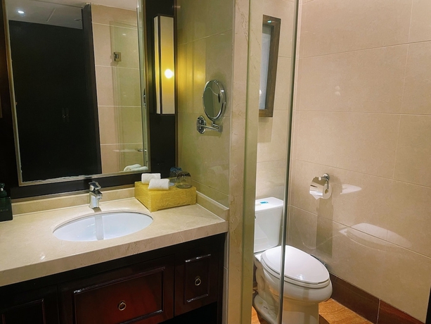 Imagen de la habitación del Hotel runhuasijidajiudian. Foto 15