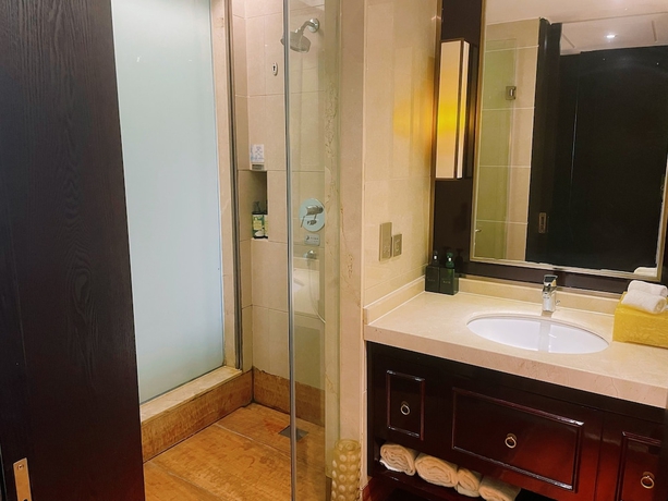 Imagen de la habitación del Hotel runhuasijidajiudian. Foto 16