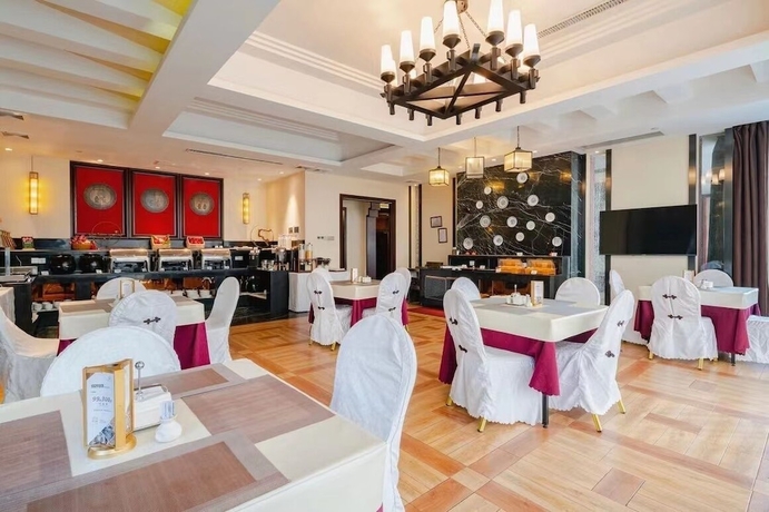 Imagen del bar/restaurante del Hotel runhuasijidajiudian. Foto 2