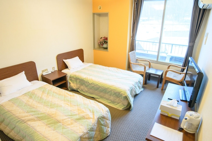 Imagen de la habitación del Hotel ryobou hanaemi. Foto 4