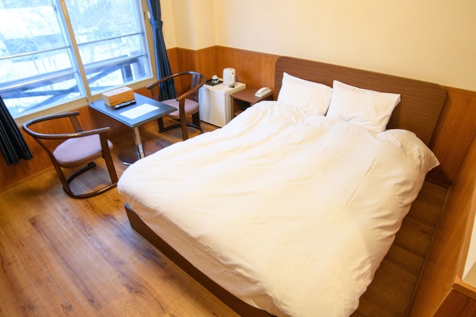 Imagen de la habitación del Hotel ryobou hanaemi. Foto 7