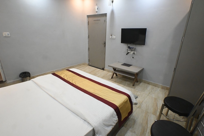 Imagen de la habitación del Hotel sandhya paying guest house. Foto 10