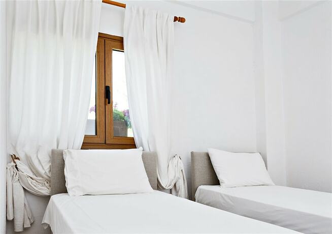 Imagen de la habitación del Hotel sanidiamonds. Foto 19