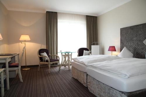 Imagen de la habitación del Hotel schloss Friedestrom. Foto 10