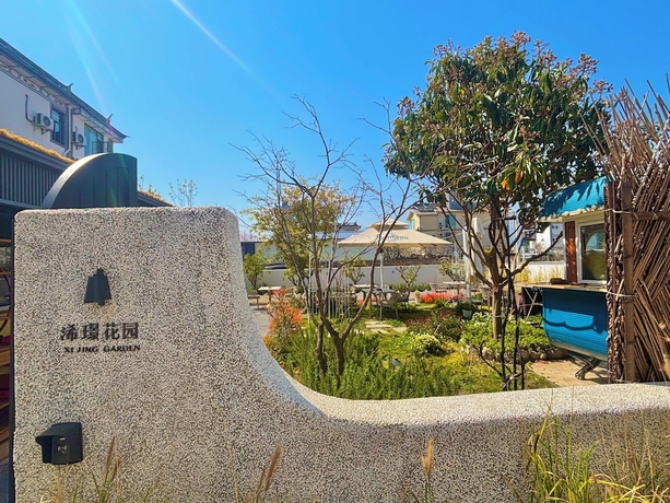 Imagen de los exteriores del Hotel shanhaixijing.Garden Holiday Homestay. Foto 15
