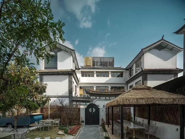 Imagen de los exteriores del Hotel shanhaixijing.Garden Holiday Homestay. Foto 16