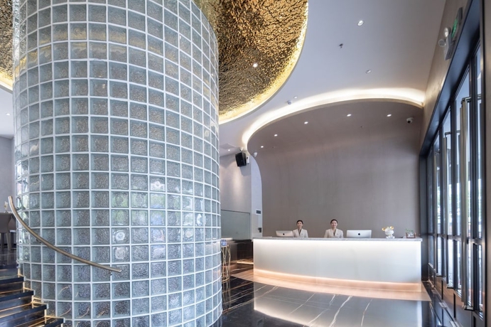 Imagen de los interiores del Hotel shenzhenshijinyuehuayuanjiudian. Foto 9