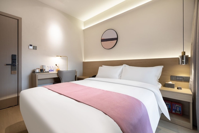 Imagen de la habitación del Hotel shenzhenshijinyuehuayuanjiudian. Foto 4