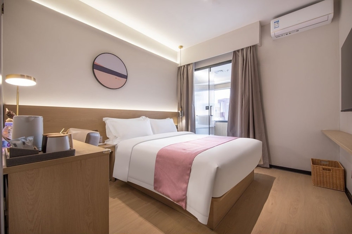 Imagen de la habitación del Hotel shenzhenshijinyuehuayuanjiudian. Foto 5