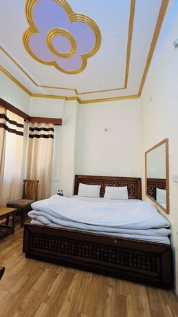 Imagen de la habitación del Hotel shimla hills international. Foto 9