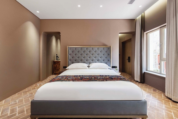 Imagen de la habitación del Hotel siluyouyuexiyumeixuesuji. Foto 2