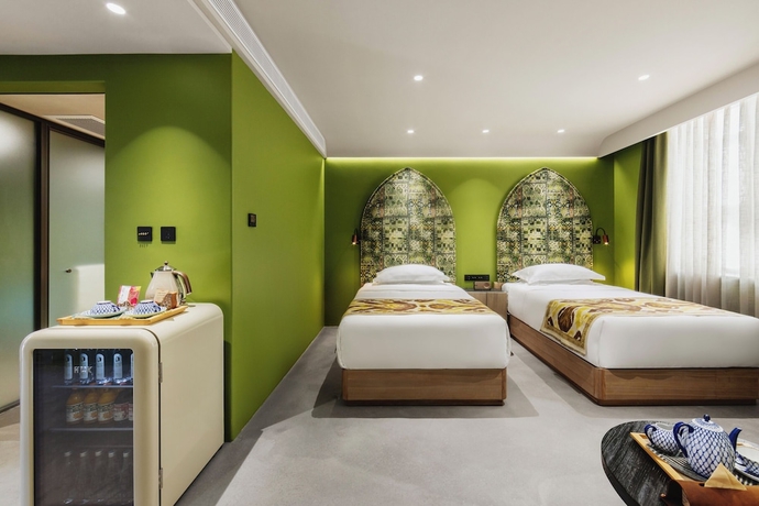 Imagen de la habitación del Hotel siluyouyuexiyumeixuesuji. Foto 5