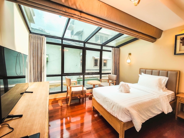 Imagen de la habitación del Hotel siri grand bangkok hotel. Foto 11