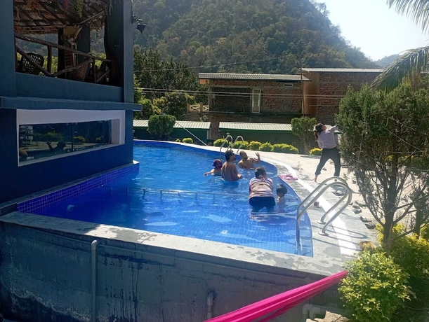 Imagen de la piscina del Hotel sky ganga resort. Foto 16