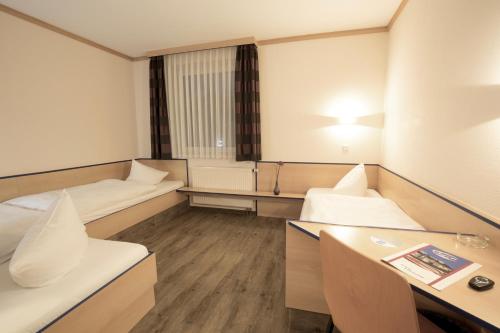 Imagen de la habitación del Hotel sleep & go. Foto 5