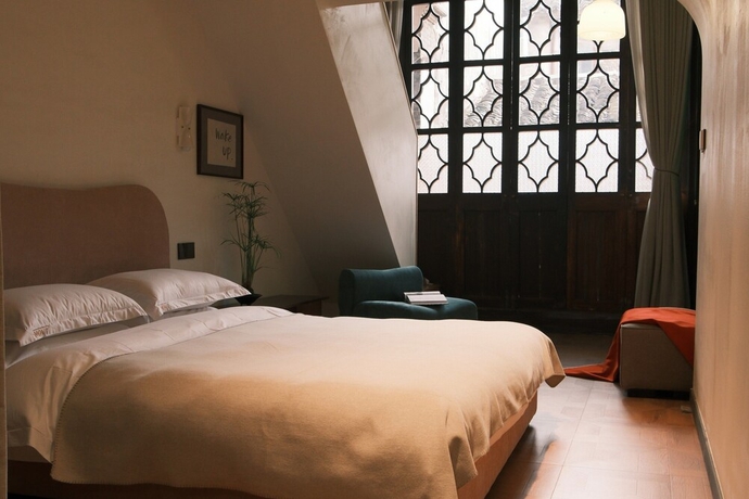Imagen de la habitación del Hotel songzhiyu 3 pingjianglu. Foto 3