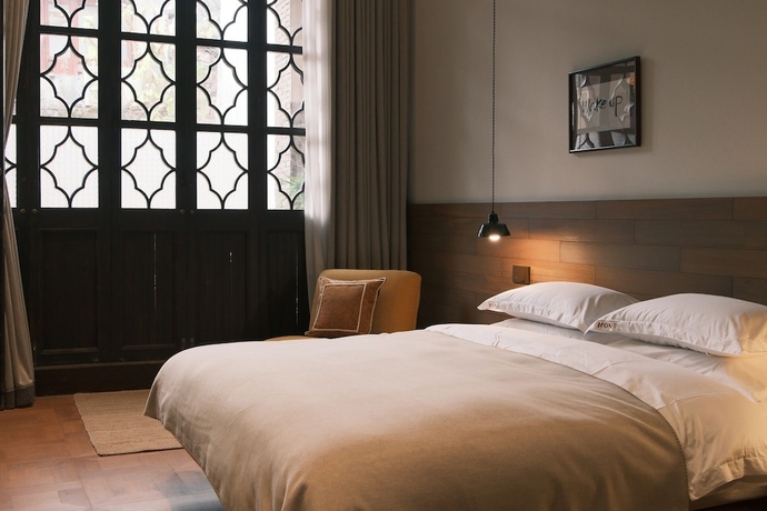 Imagen de la habitación del Hotel songzhiyu 3 pingjianglu. Foto 6