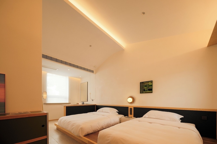 Imagen de la habitación del Hotel songzhiyu 3 pingjianglu. Foto 10