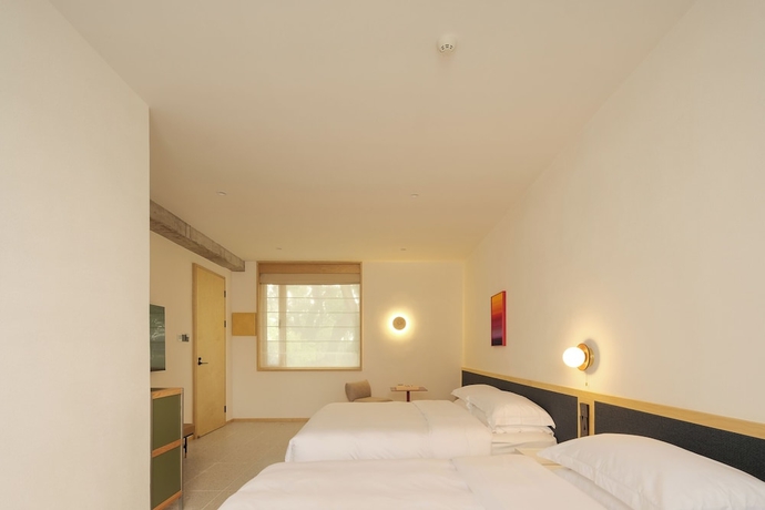 Imagen de la habitación del Hotel songzhiyu 3 pingjianglu. Foto 13