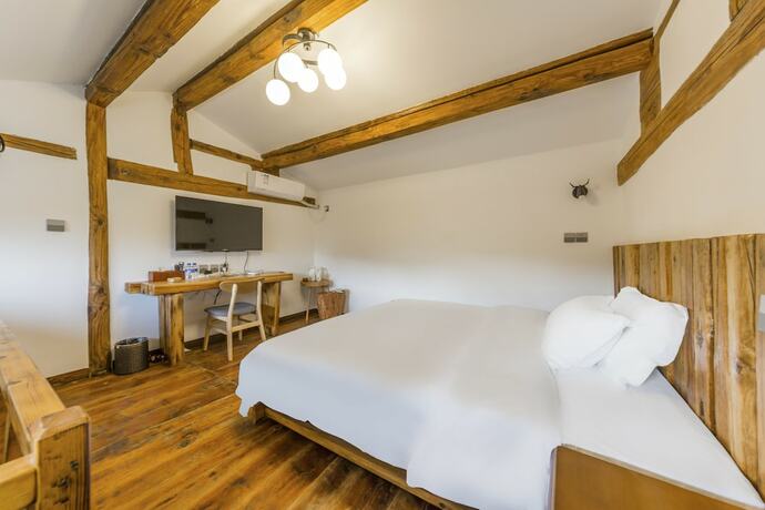 Imagen de la habitación del Hotel spring guesthouse. Foto 13
