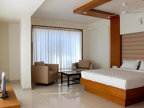 Imagen de la habitación del Hotel srijan inn. Foto 19