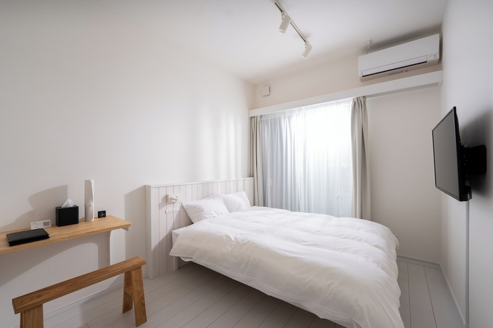 Imagen de la habitación del Hotel stella stay. Foto 5