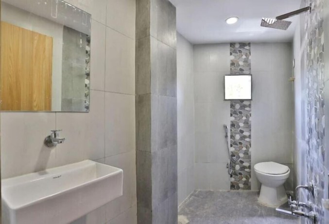 Imagen de la habitación del Hotel sunsarovar. Foto 6