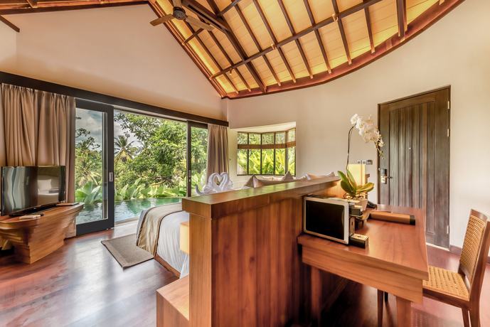 Imagen de la habitación del Hotel tanadewa Resort Ubud Bali by Cross Collection. Foto 19