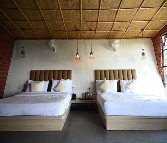 Imagen de la habitación del Hotel tatvam resort. Foto 3