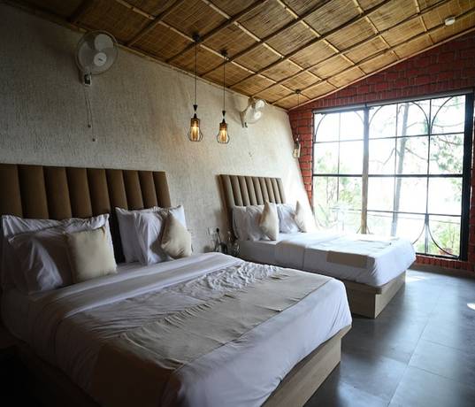 Imagen de la habitación del Hotel tatvam resort. Foto 4