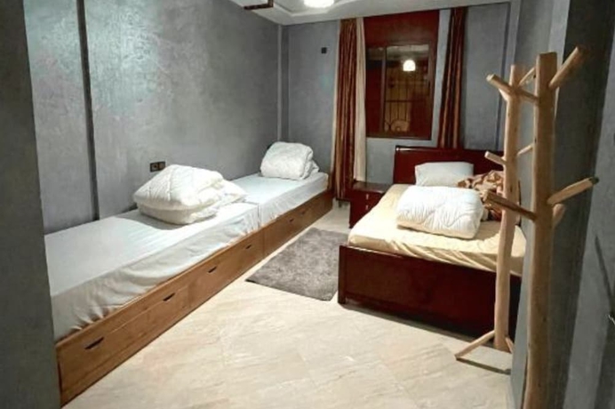 Imagen de la habitación del Hotel tayri surf house. Foto 2