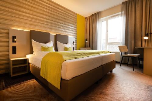Imagen de la habitación del Hotel th Leipzig Messe New 2021. Foto 17