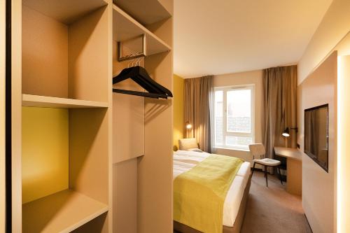 Imagen de la habitación del Hotel th Leipzig Messe New 2021. Foto 19