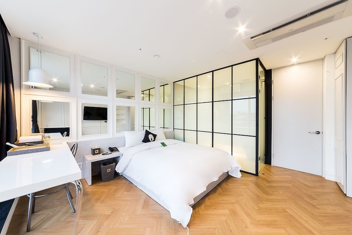 Imagen de la habitación del Hotel the Designers Seoul station. Foto 17